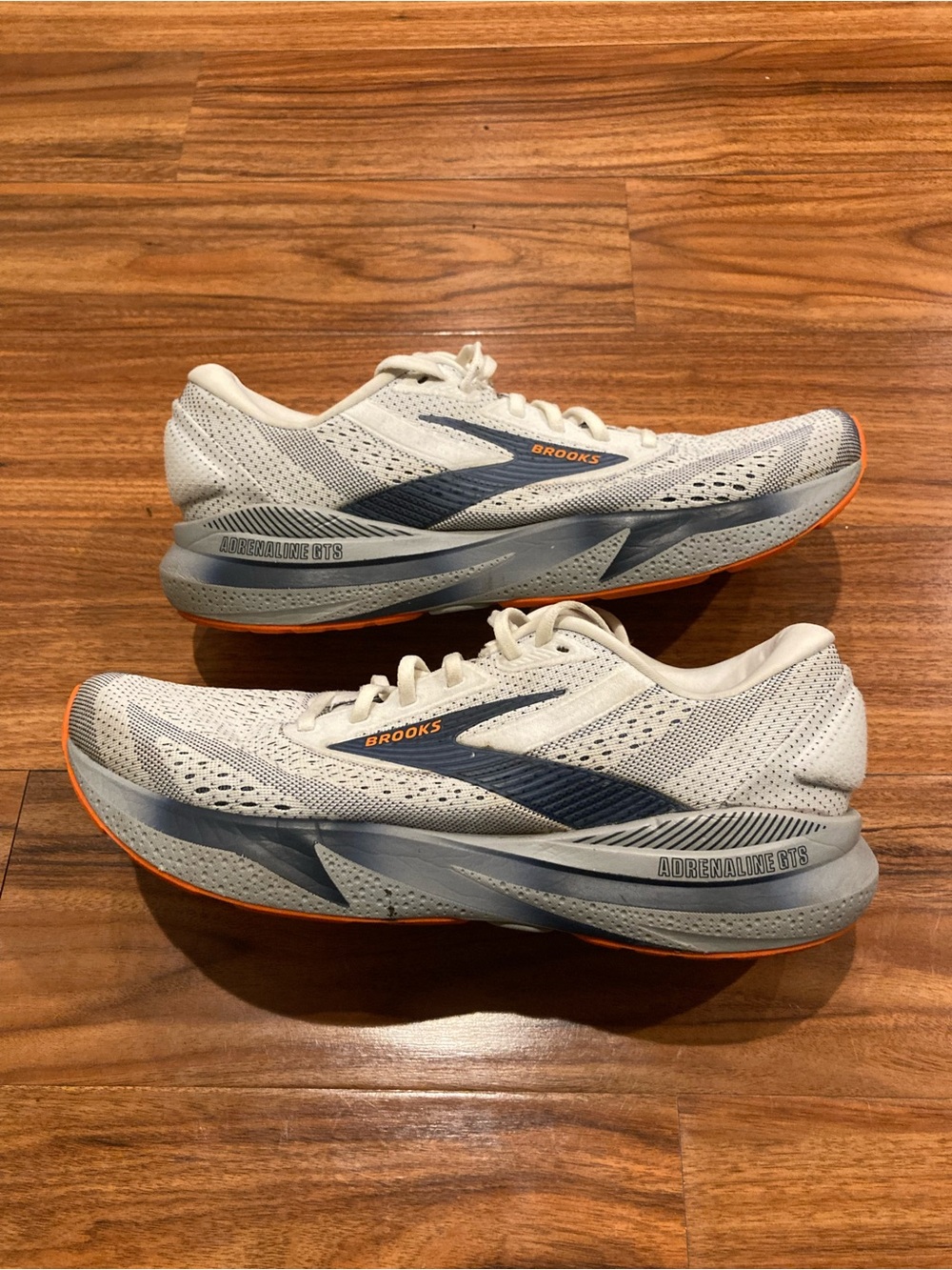 Brooks Women's Running Shoes in White with Blue and Orange Accents